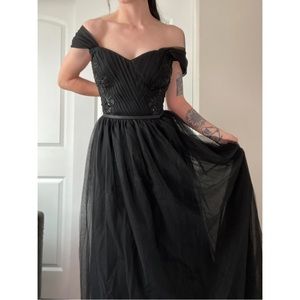 Never worn formal black gown.